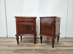 Pair of 1950s Art Deco nightstands with mirrored tops