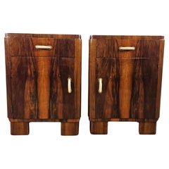 Pair of Art Deco bedside tables in walnut burl with bakelite handles