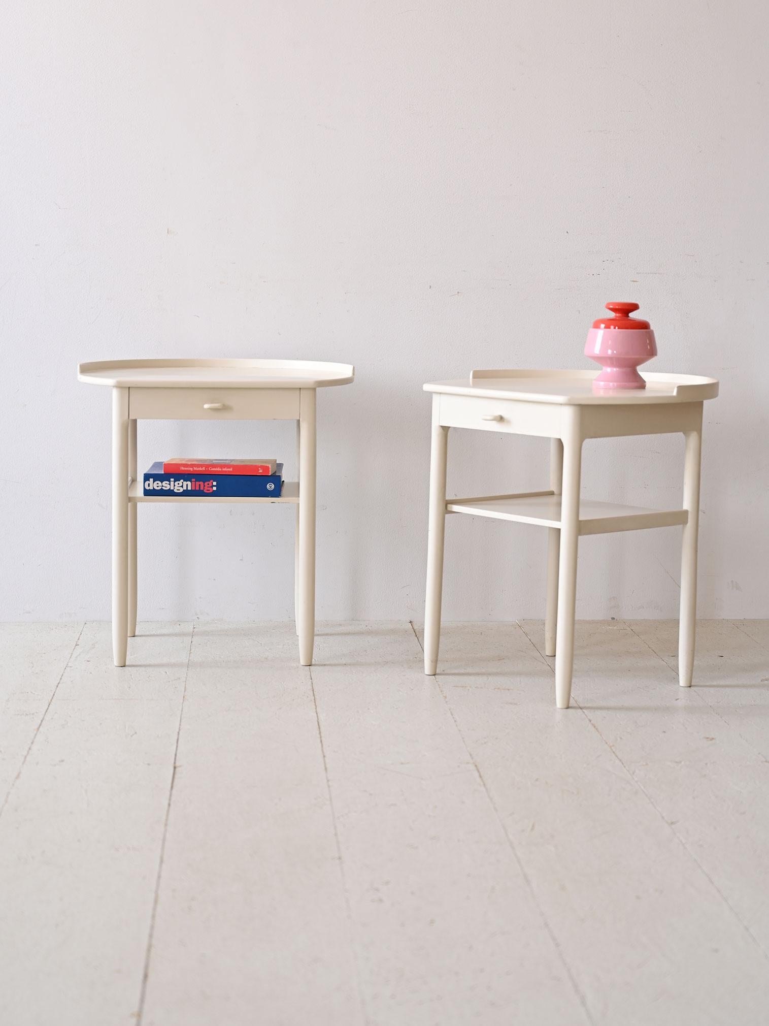 1960s white wooden bedside tables.                                                                                                                                                                               Timeless elegance to your room with this