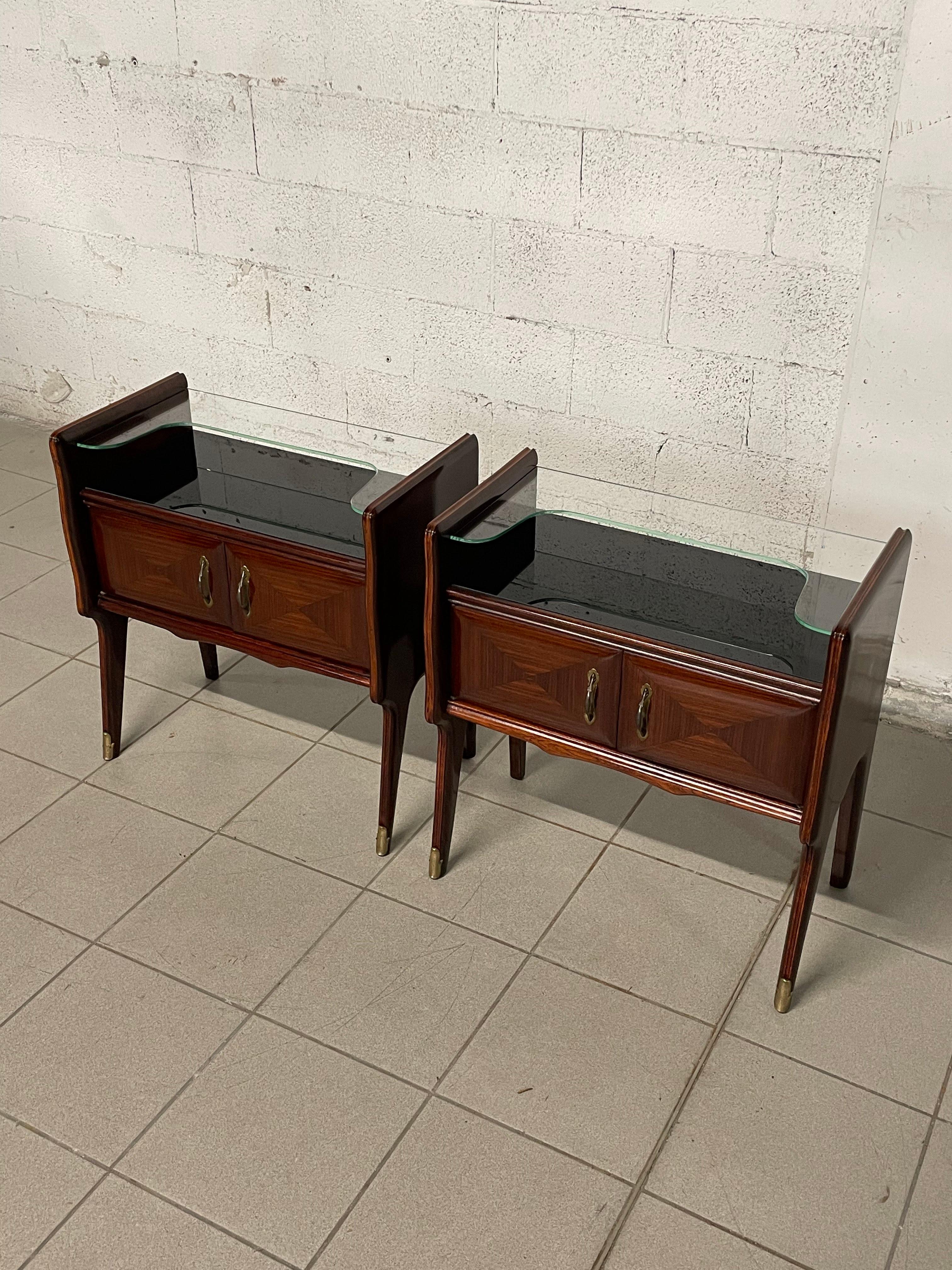Italian Pair of mahogany and glass bedside tables from the 1950s