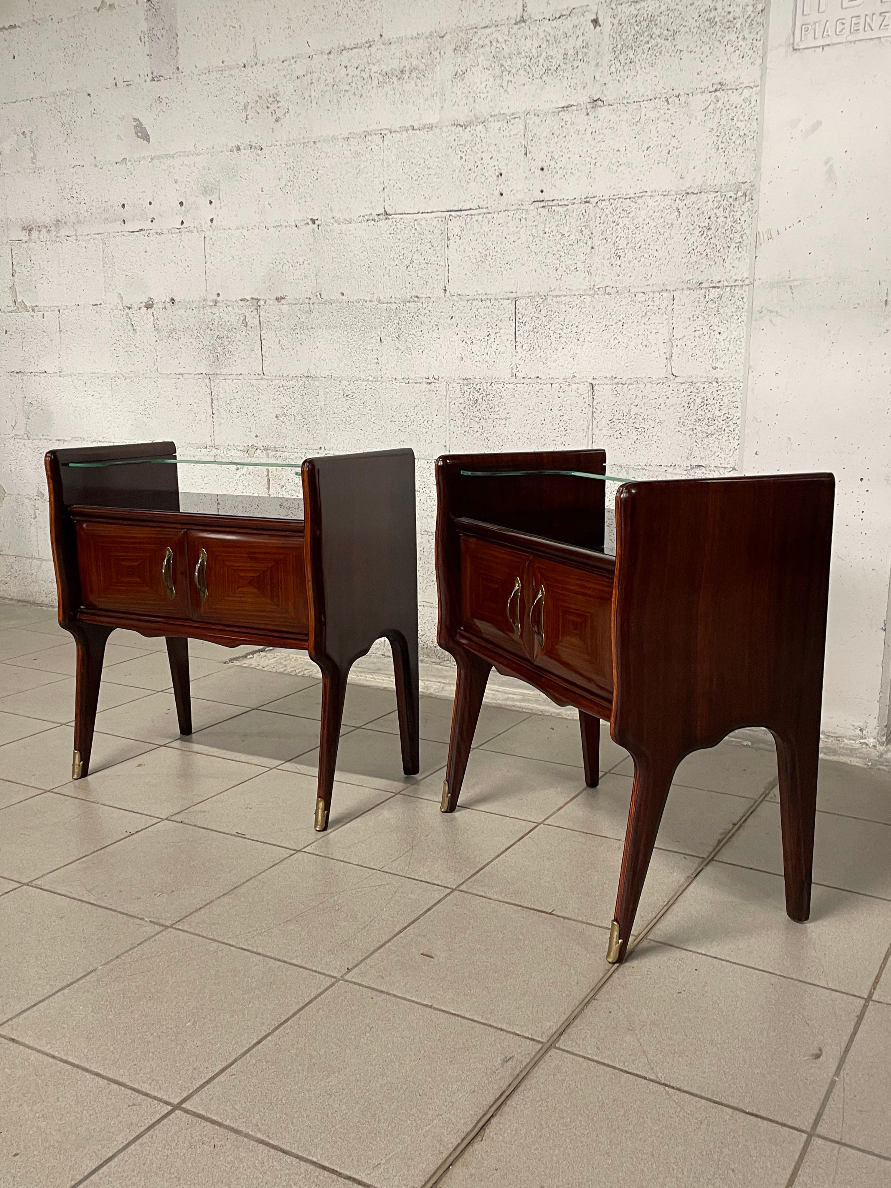 Pair of mahogany and glass bedside tables from the 1950s 1