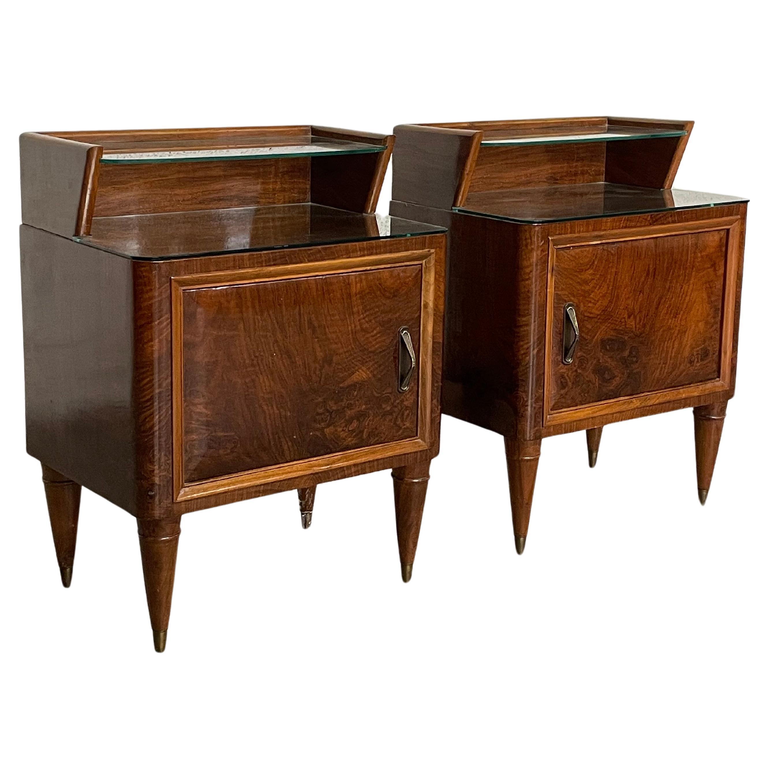 Pair of mahogany and glass bedside tables from the 1950s