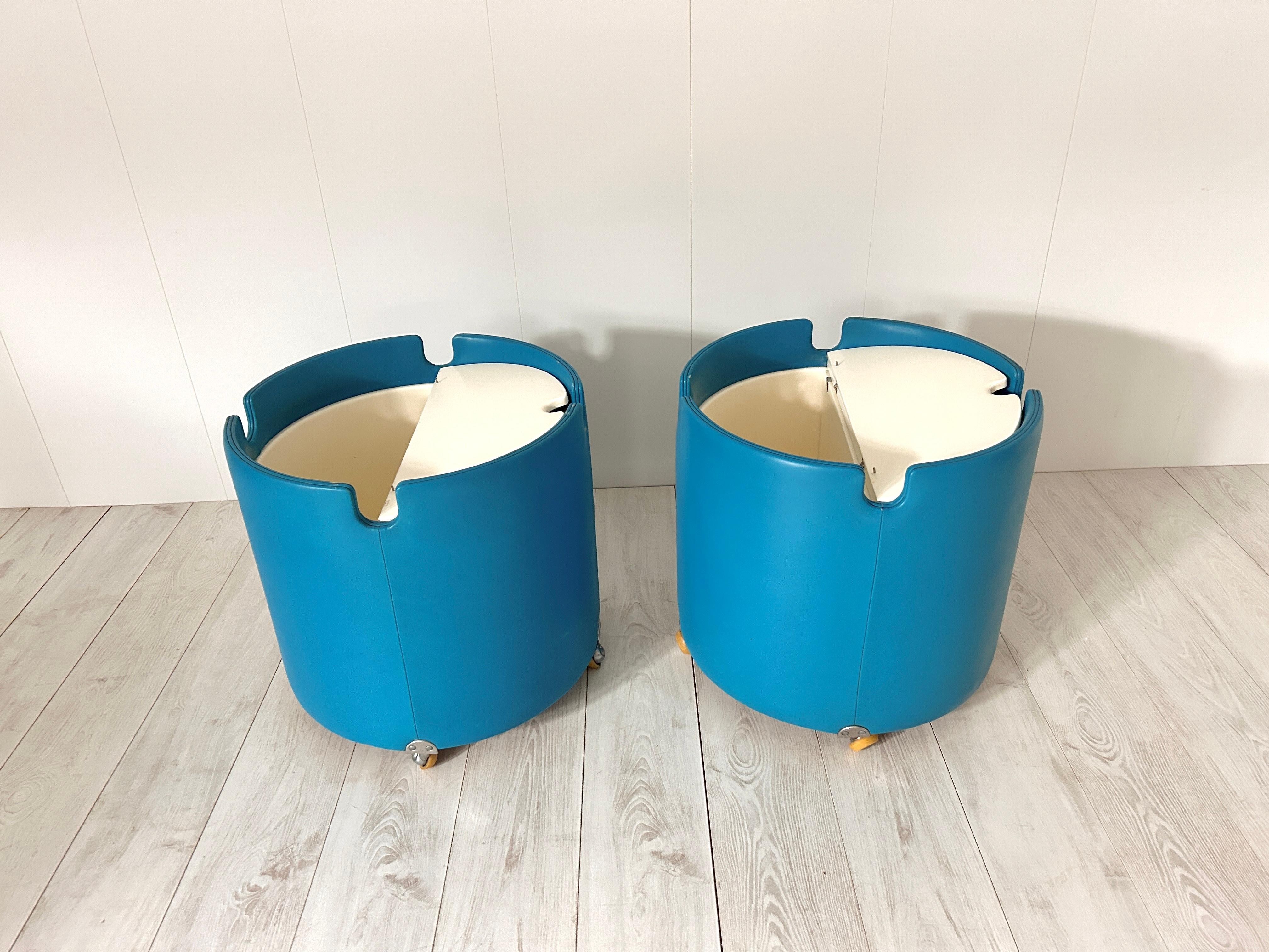 Rare pair of bedside tables signed Luigi Massoni for Poltrona Frau, Italy, 1970s.
In shades of turquoise, the nightstands have a white wooden table top and two storage compartments inside.

Good vintage condition, some stains on inside of