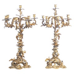Pair of large six-lumen Napoleon III candelabra in gilded bronze. Mid-1800s