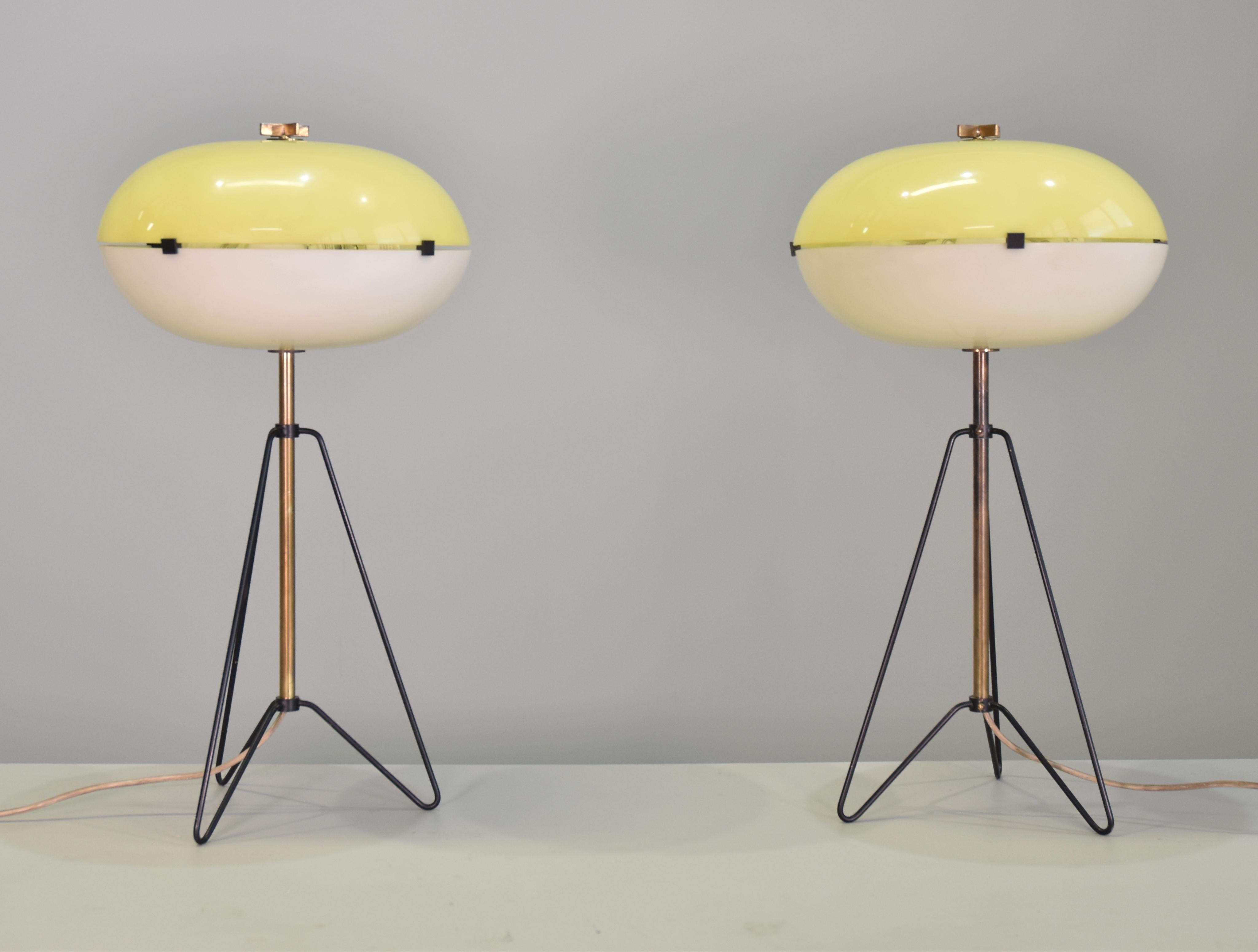 Pair of Large Brass and Methacrylate Lamps Italy 1955 Published very rare brass, black lacquered metal, lucite shades in white and yellow methacrylate plastic resin, adjustable brass arm. Original Stilnovo stamp inside the shade. Famous design such