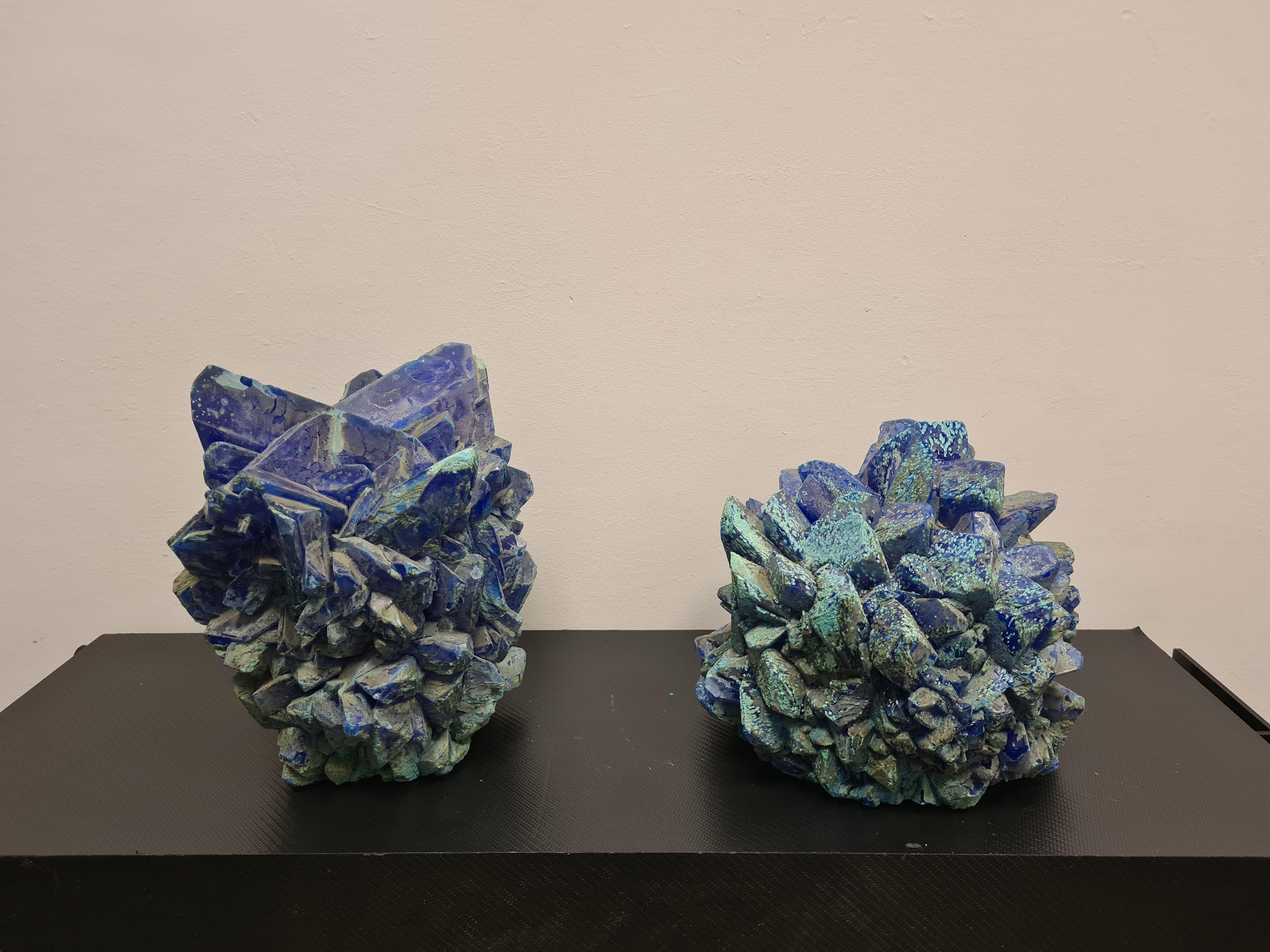 Two large Calcantite Minerals.

Pair of beautiful mineral crystals.

Calcantite is a mineral composed of copper sulfate hydrate.

It occurs in prismatic crystals or stalactites, has a color ranging from turquoise blue to deep blue to green with a