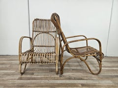 Coppia di grandi poltrone in vimini anni '70