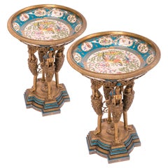 Pair of French ceramic and bronze Guéridons from the 1800s