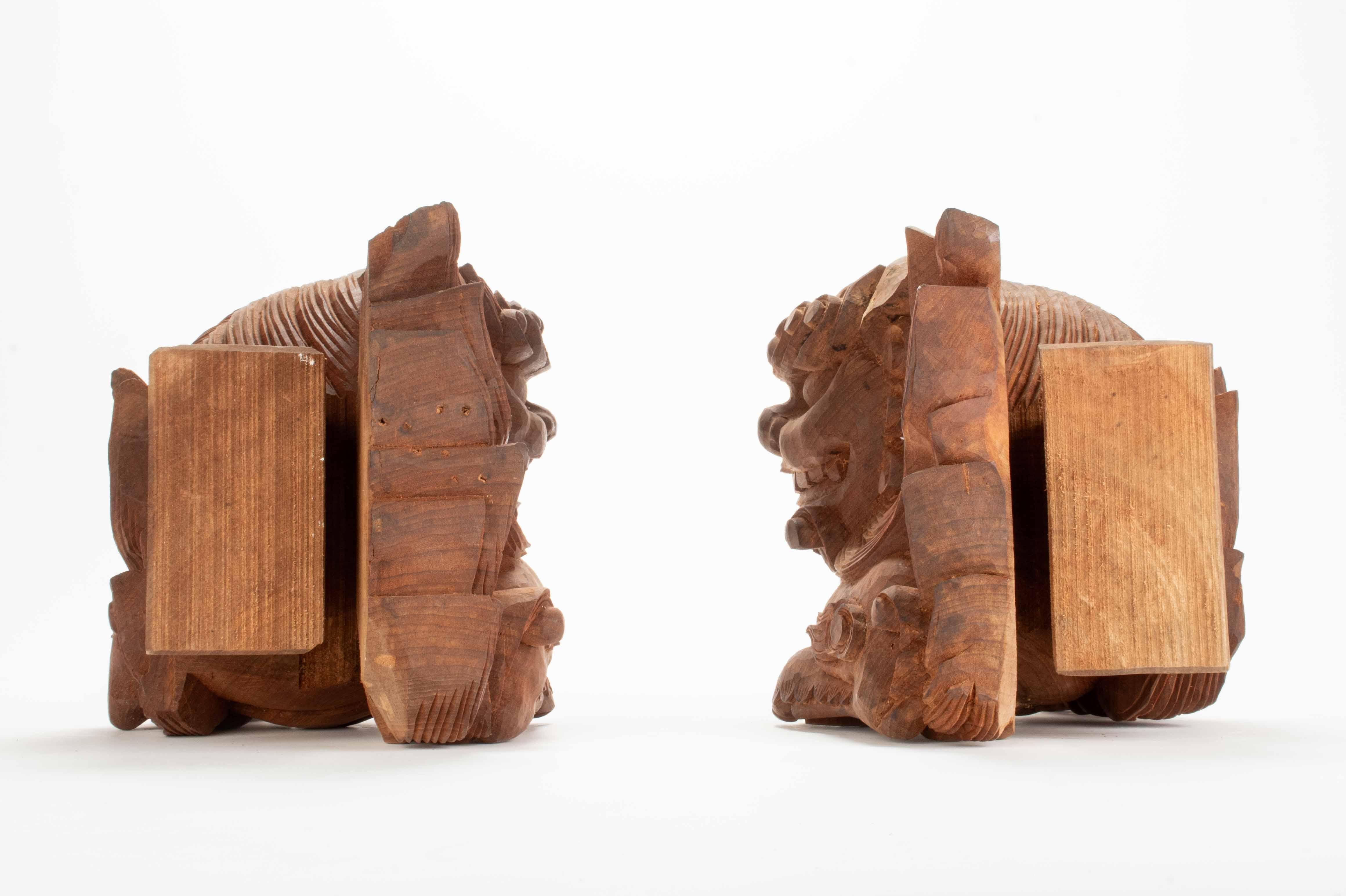 Fruitwood Pair of shishi-shaped kibana For Sale