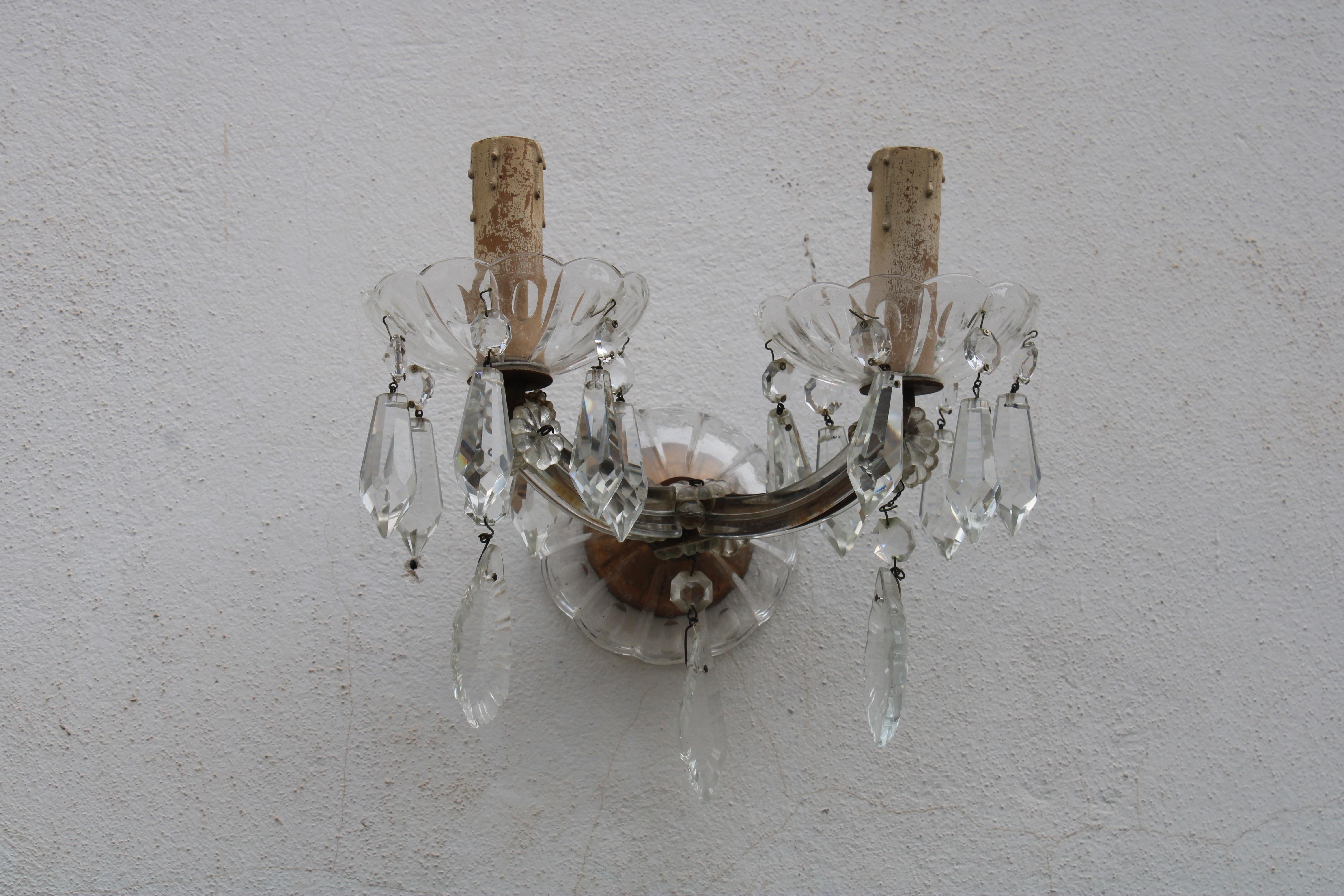 Elegant pair of crystal wall lamps 