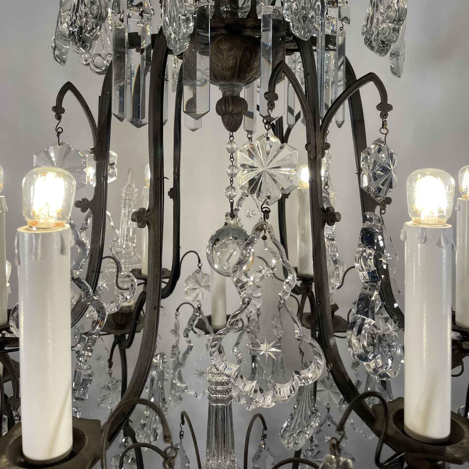 Pair of French Crystal and Bronze Twelve-Light Chandeliers Mid-20th Century 9