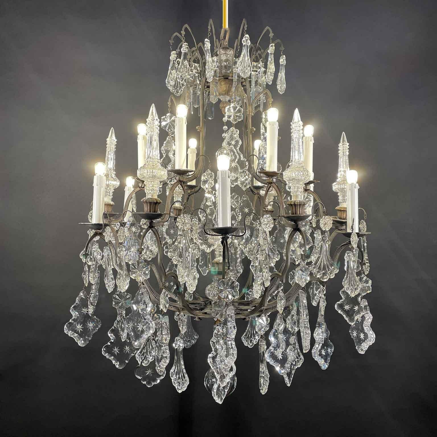 Pair of French Crystal and Bronze Twelve-Light Chandeliers Mid-20th Century In Good Condition In Milano, MI