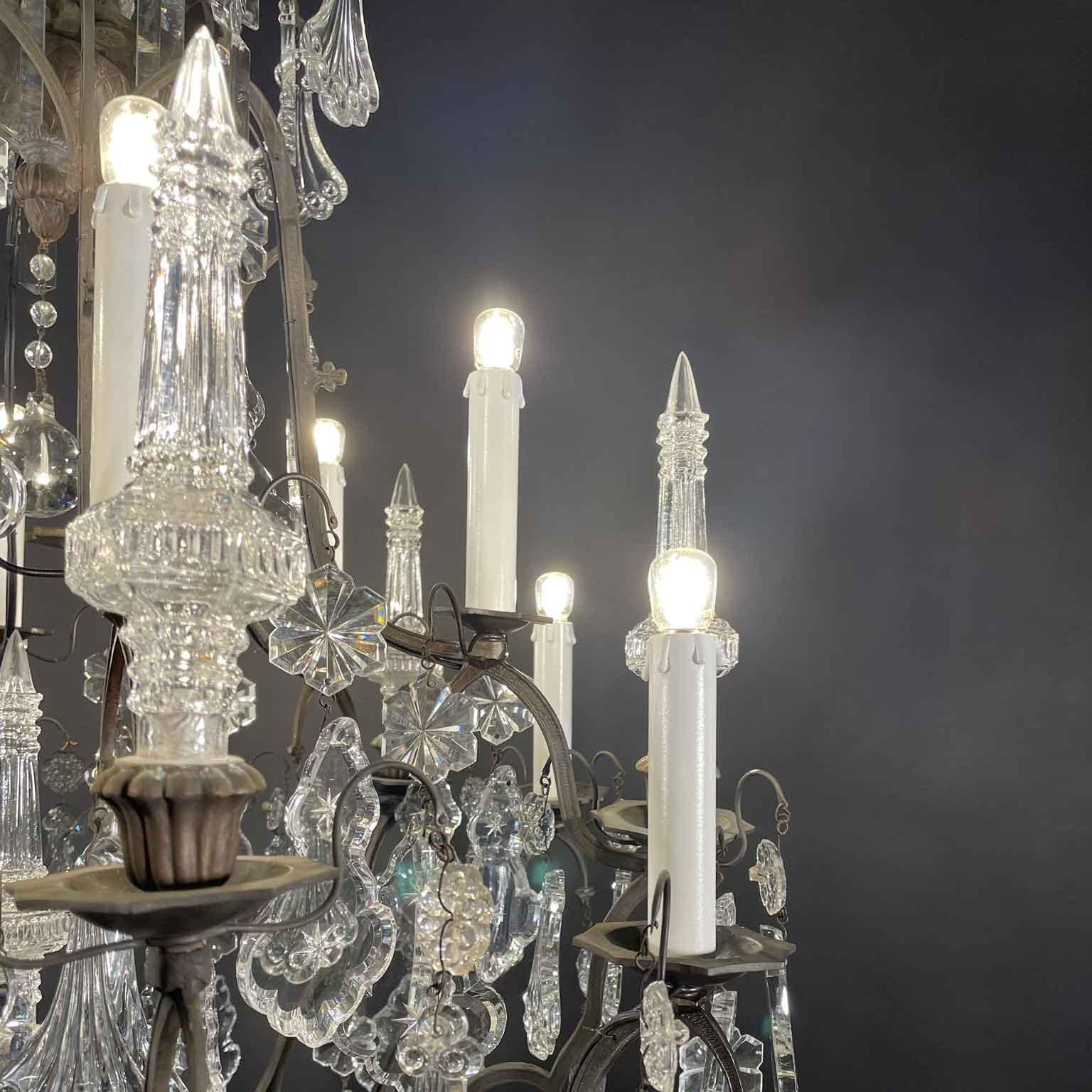 Pair of French Crystal and Bronze Twelve-Light Chandeliers Mid-20th Century 4