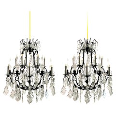 Pair of French Crystal and Bronze Twelve-Light Chandeliers Mid-20th Century