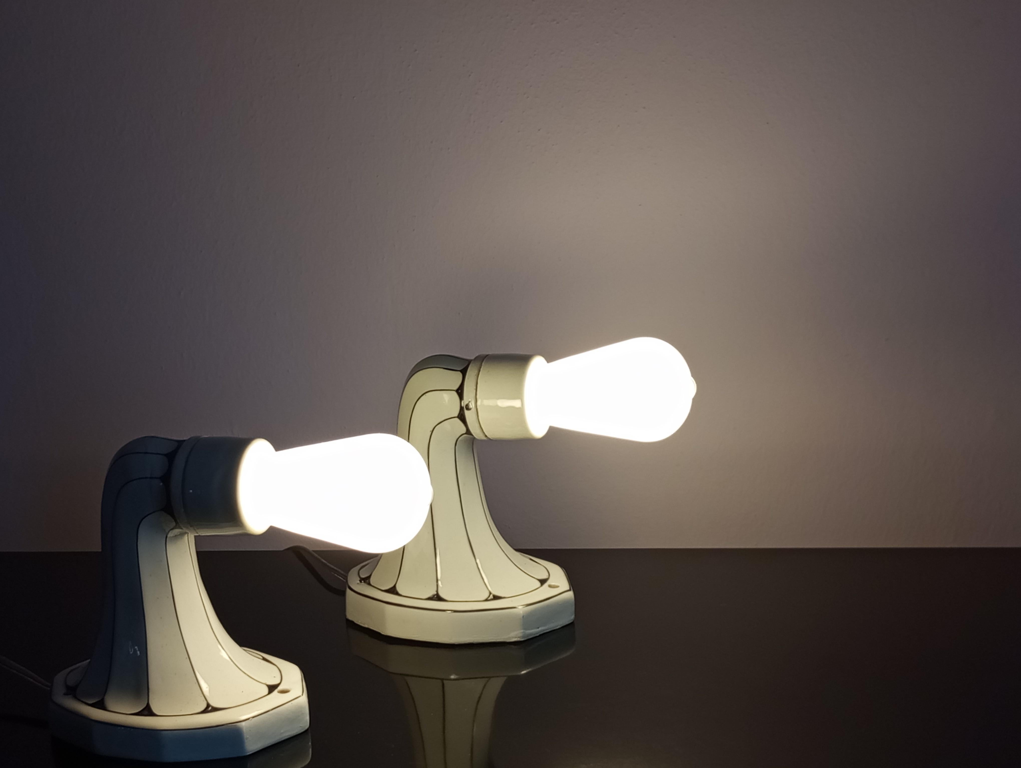 Coppia di lampade da parete Art Noveau in pocellana  di 