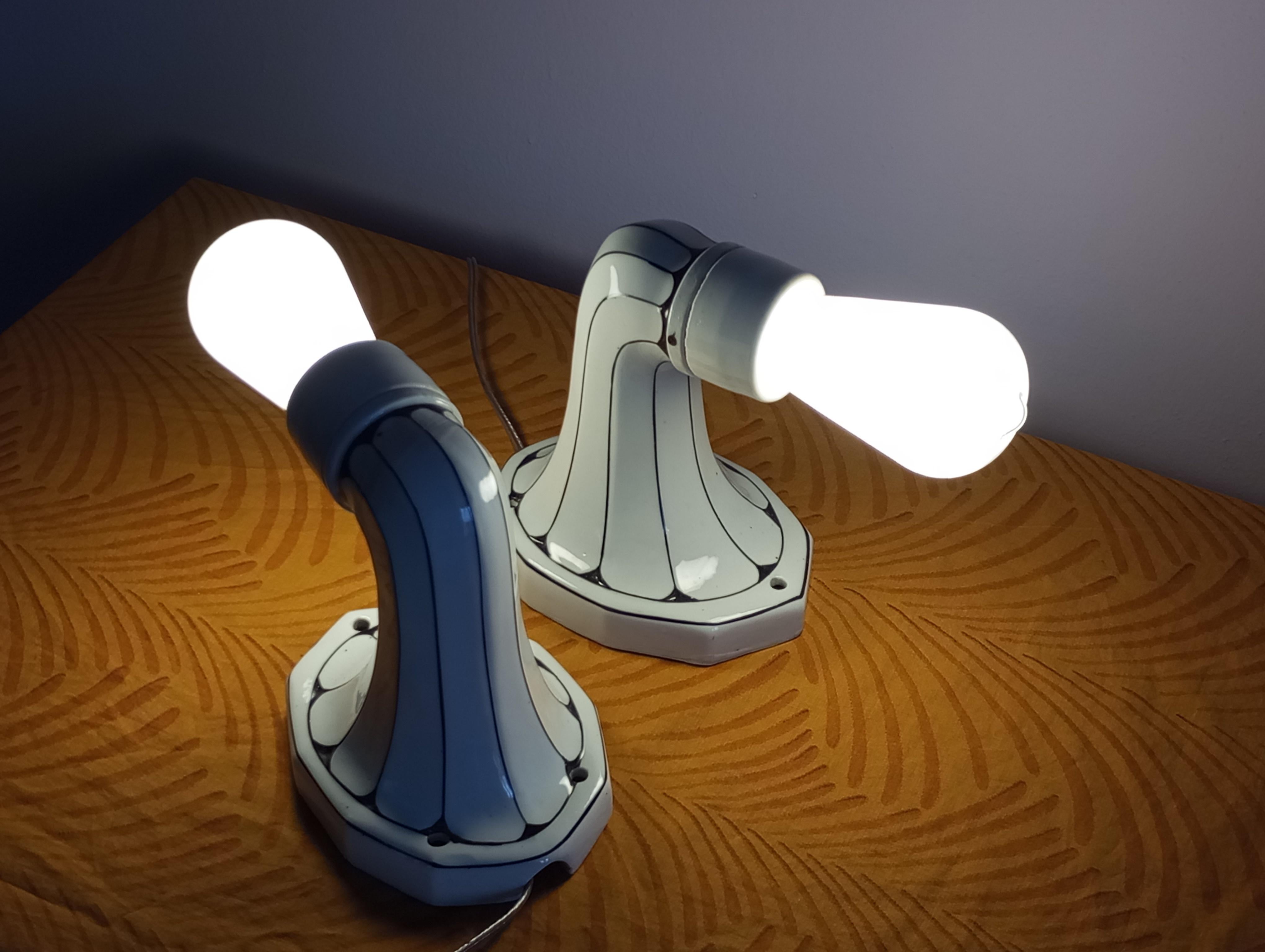 Coppia di lampade da parete Art Noveau in pocellana  di 