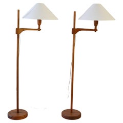 Pair of teak floor lamps by Carl Malmsten
