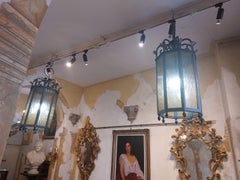 Pair of cylindrical faceted iron and glass lanterns, 1940s