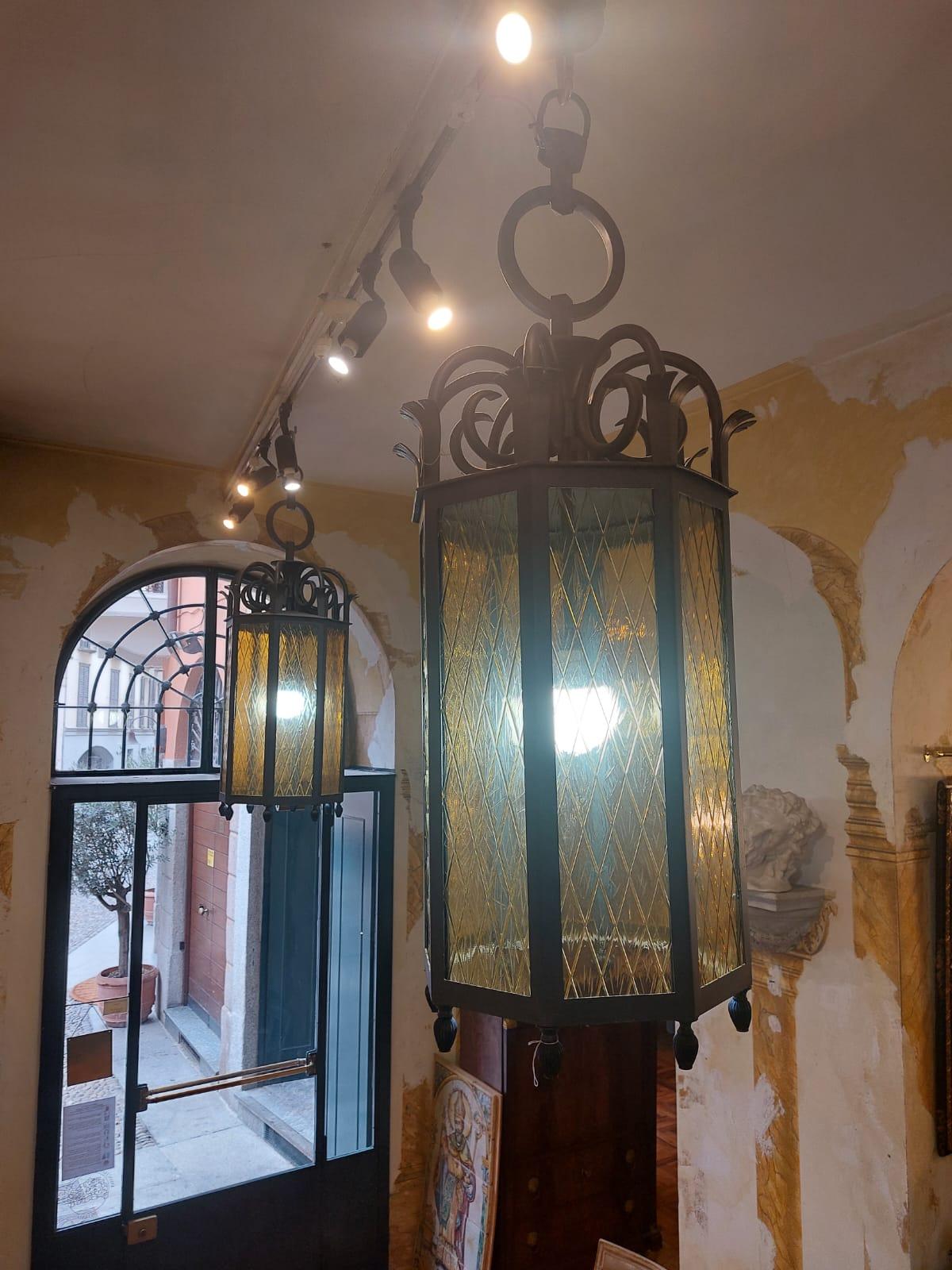 Art Deco Pair of cylindrical faceted iron and glass lanterns, 1940s For Sale