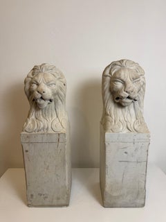 Pareja de leones florentinos en mármol blanco de Carrara —finales del siglo XIX—