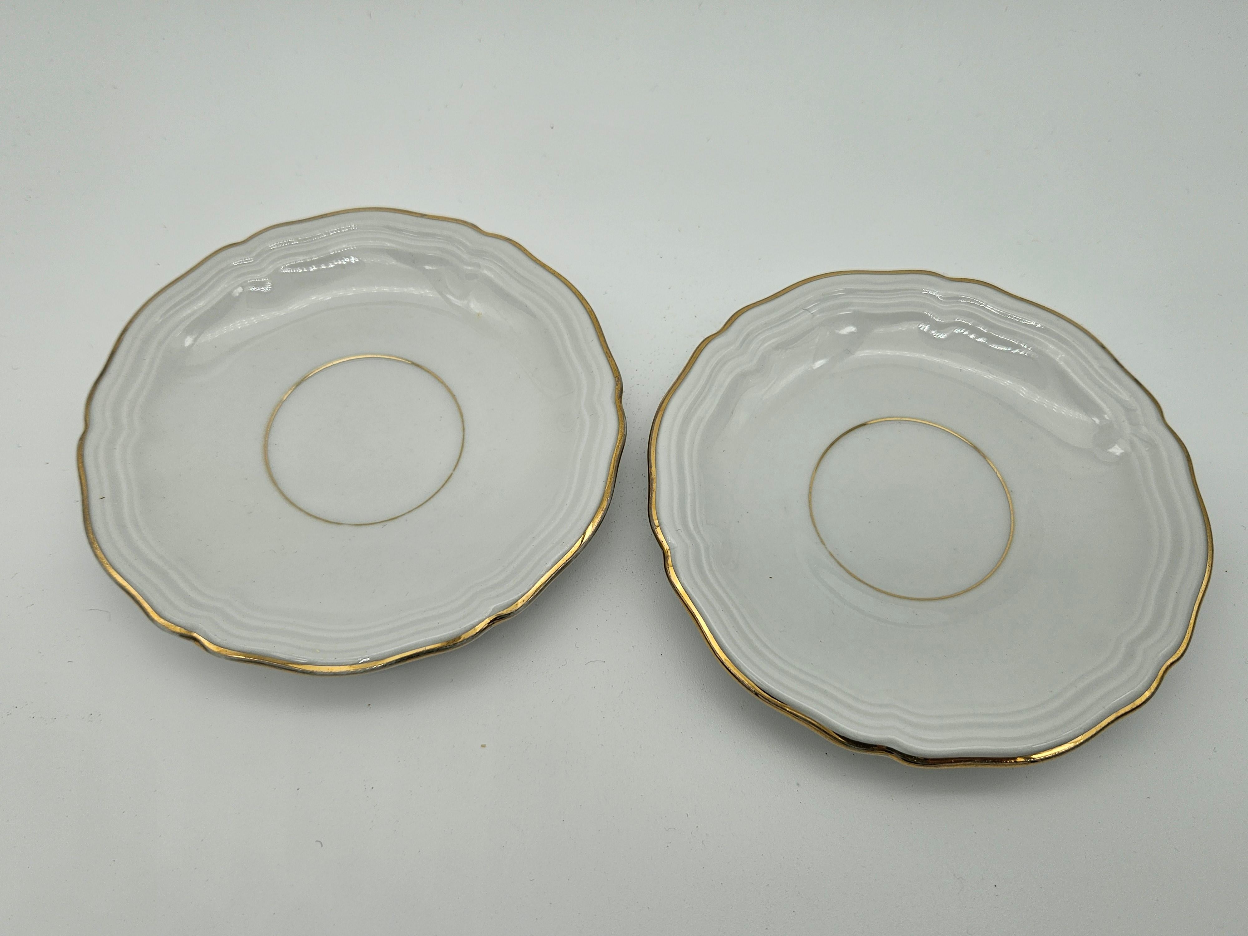 Pair of coffee cup saucers by Marie Luise Seltmann. C1950s.