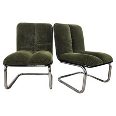 Coppia di poltroncine anni '70 in metallo cromato e stoffa verde di Cazzaro