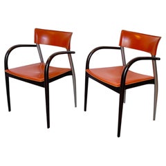 A pair of Italian designer chairs from the 1980s, in the style of Gastone Rinaldi