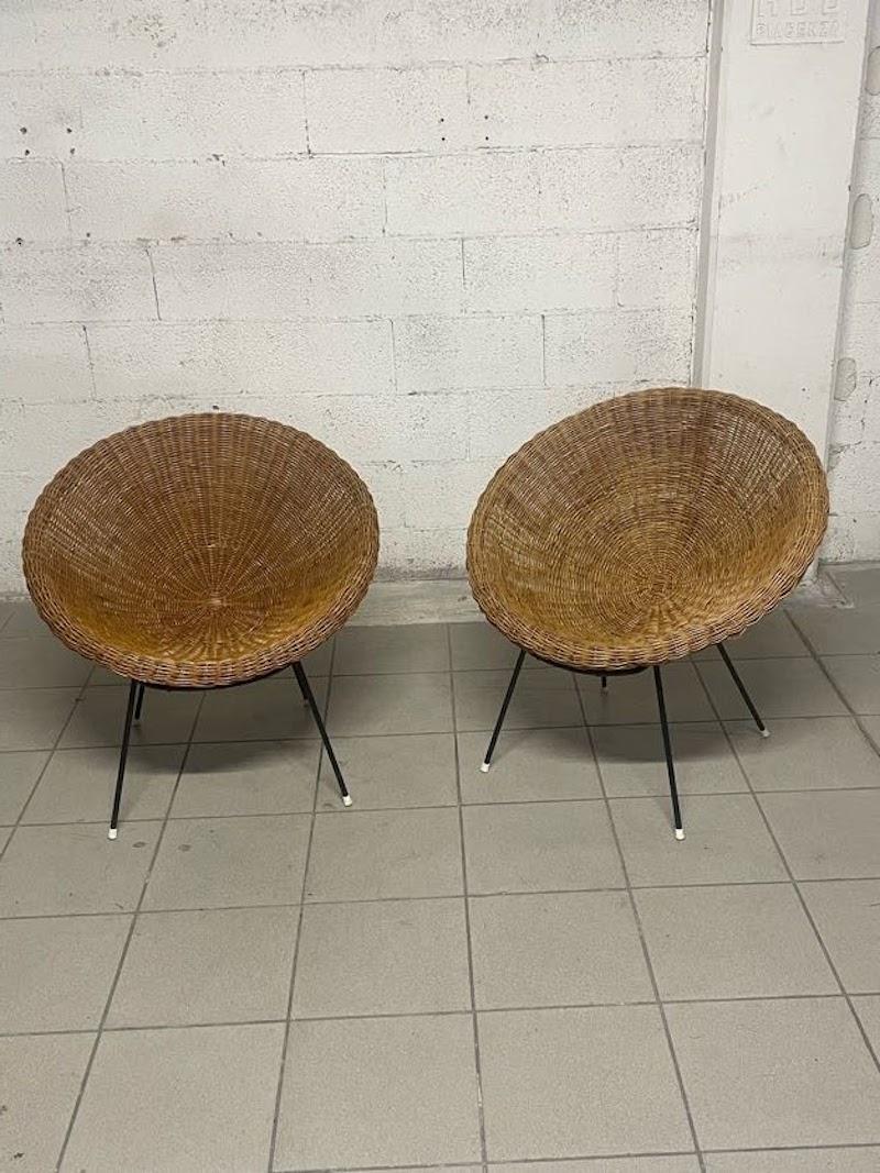 Mid-Century Modern Pair of woven wicker armchairs from the 1950s For Sale