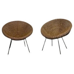 Pair of woven wicker armchairs from the 1950s