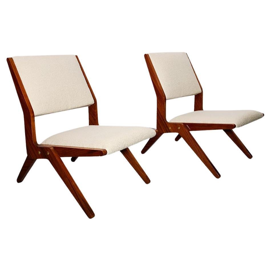 Pair of mid-century armchairs attributed to Augusto Romano in polished walnut For Sale