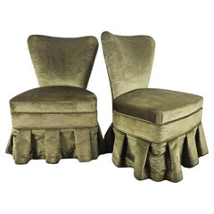 Pair of fabric-covered bedroom armchairs 20th century
