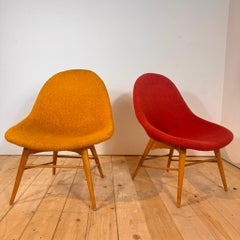 Juego de dos sillones vintage italianos de madera y tela, de los años 60