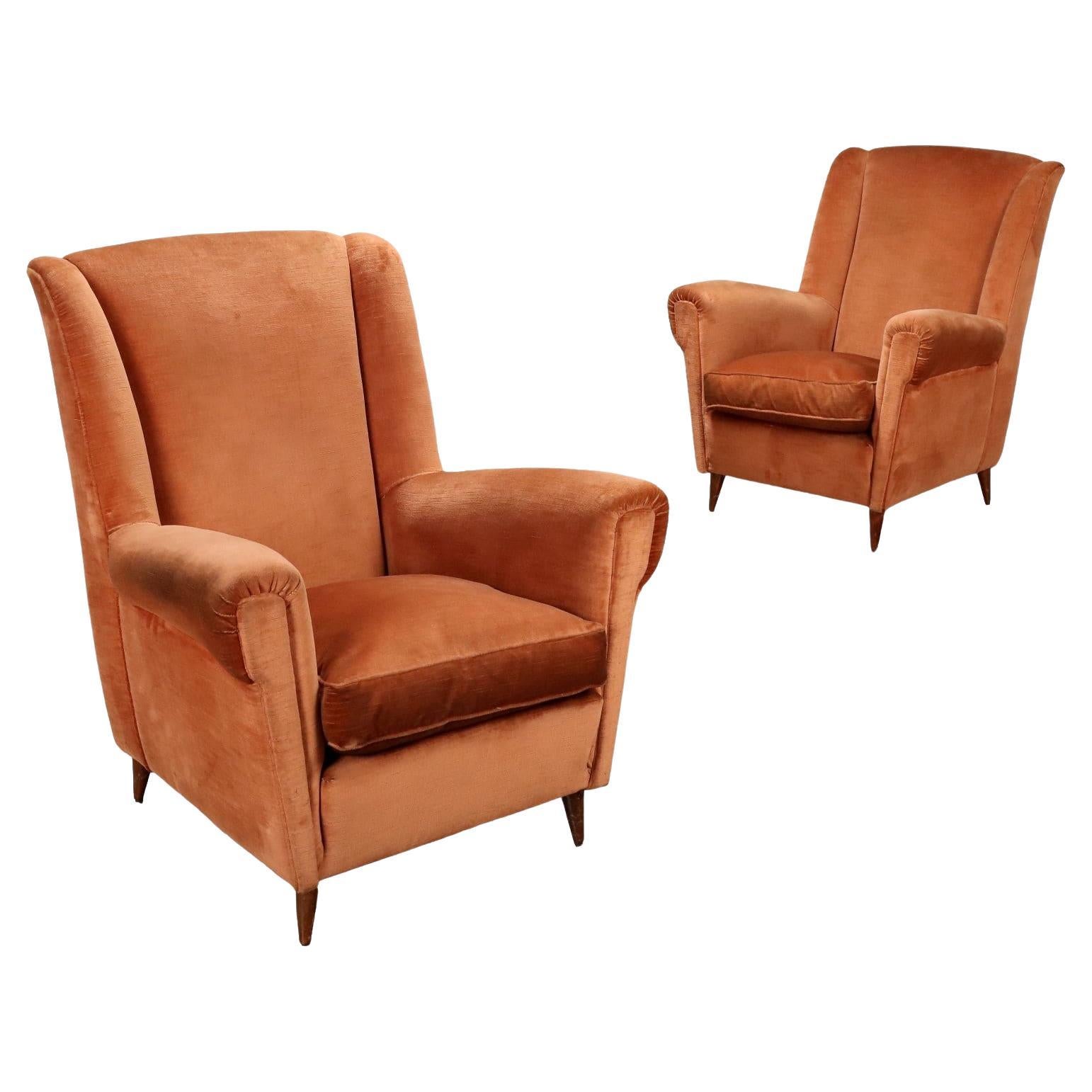 Pair of 1950s armchairs in orange velvet For Sale