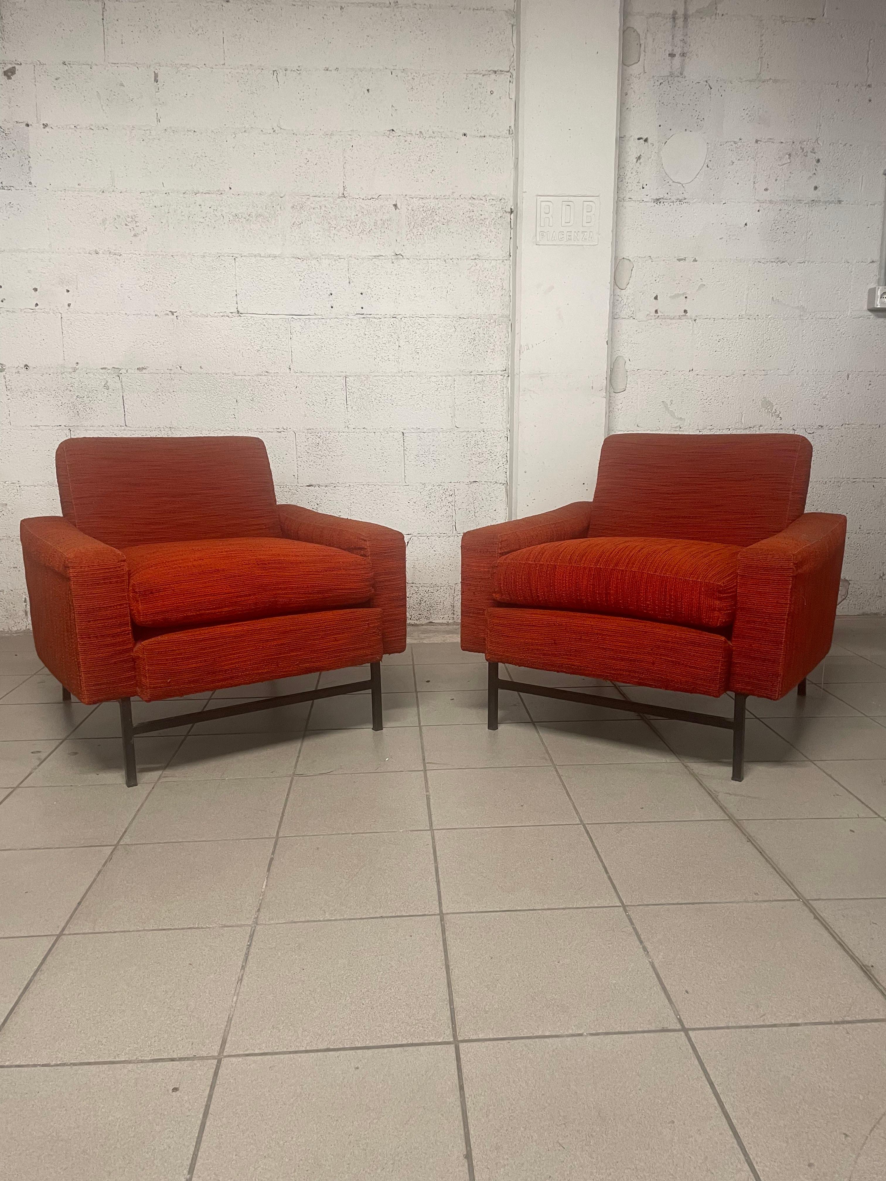 Pair of 1960s armchairs with square tubular iron frame and fabric upholstery still original.
The upholstery is sound, the original cover is in good overall condition.