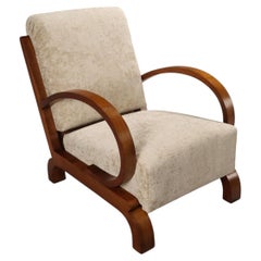 Paire de fauteuils Art déco des années 20-30, restaurés en bois et velours blanc.