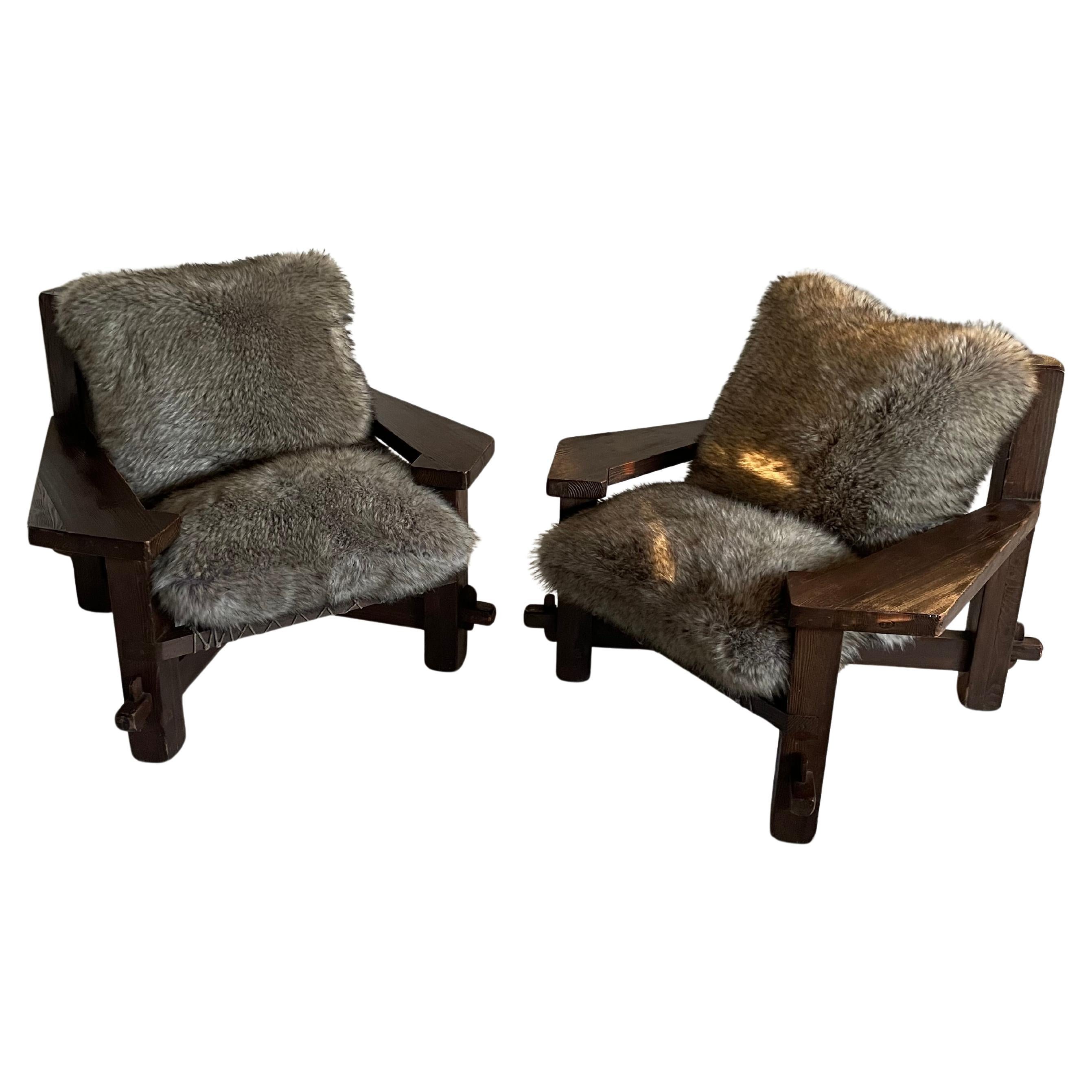 Pair of Brutalist pine wood armchairs with synthetic fur cushions For Sale