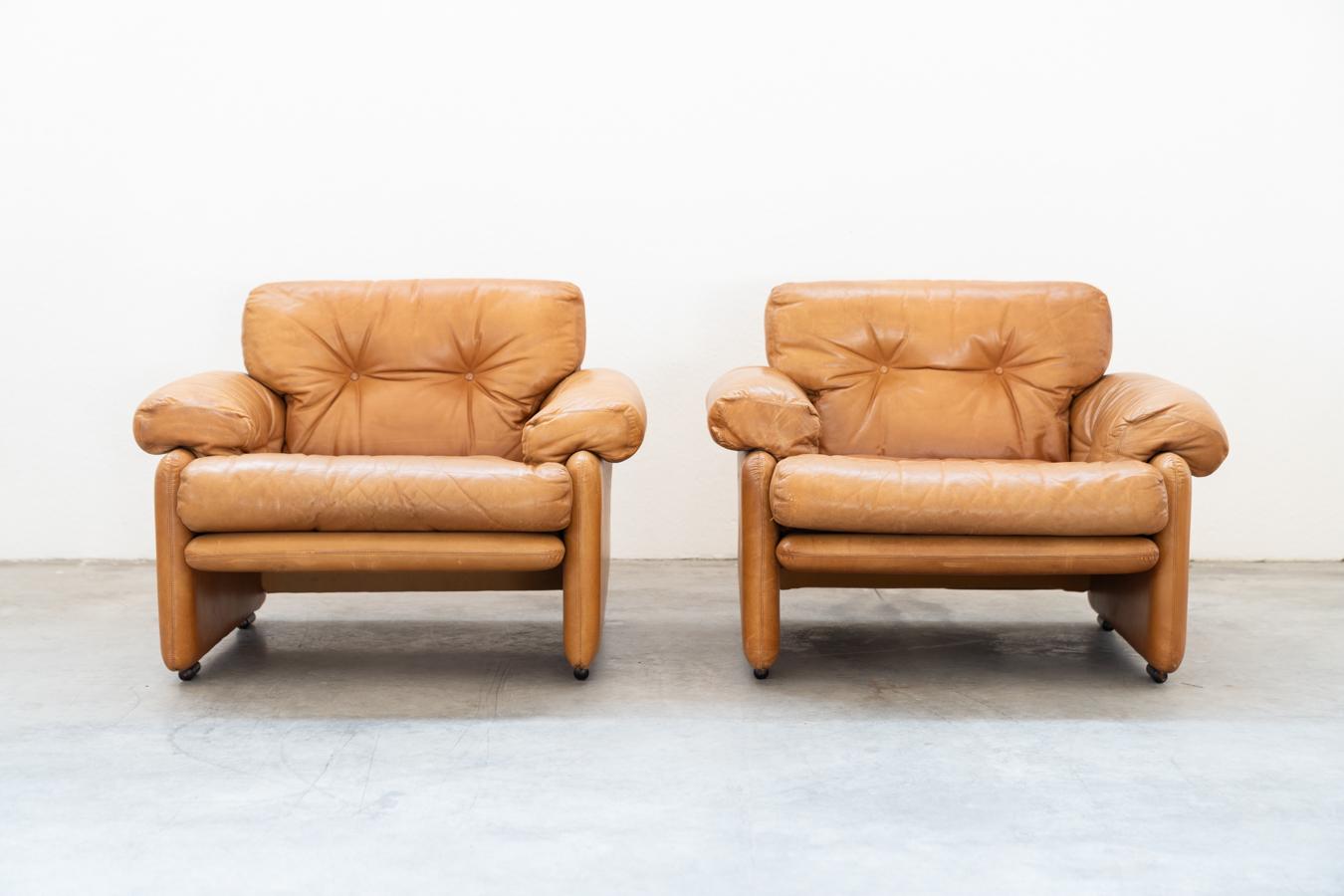 Pair of armchairs with cognac-colored pouf model 