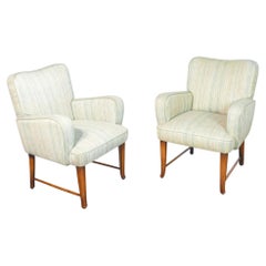 Coppia di poltrone da salotto con braccioli, design Pier Luigi COLLI. 1950s