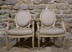 Paire de fauteuils Louis XVI en bois laqué Pierre Remy 18ème siècle
