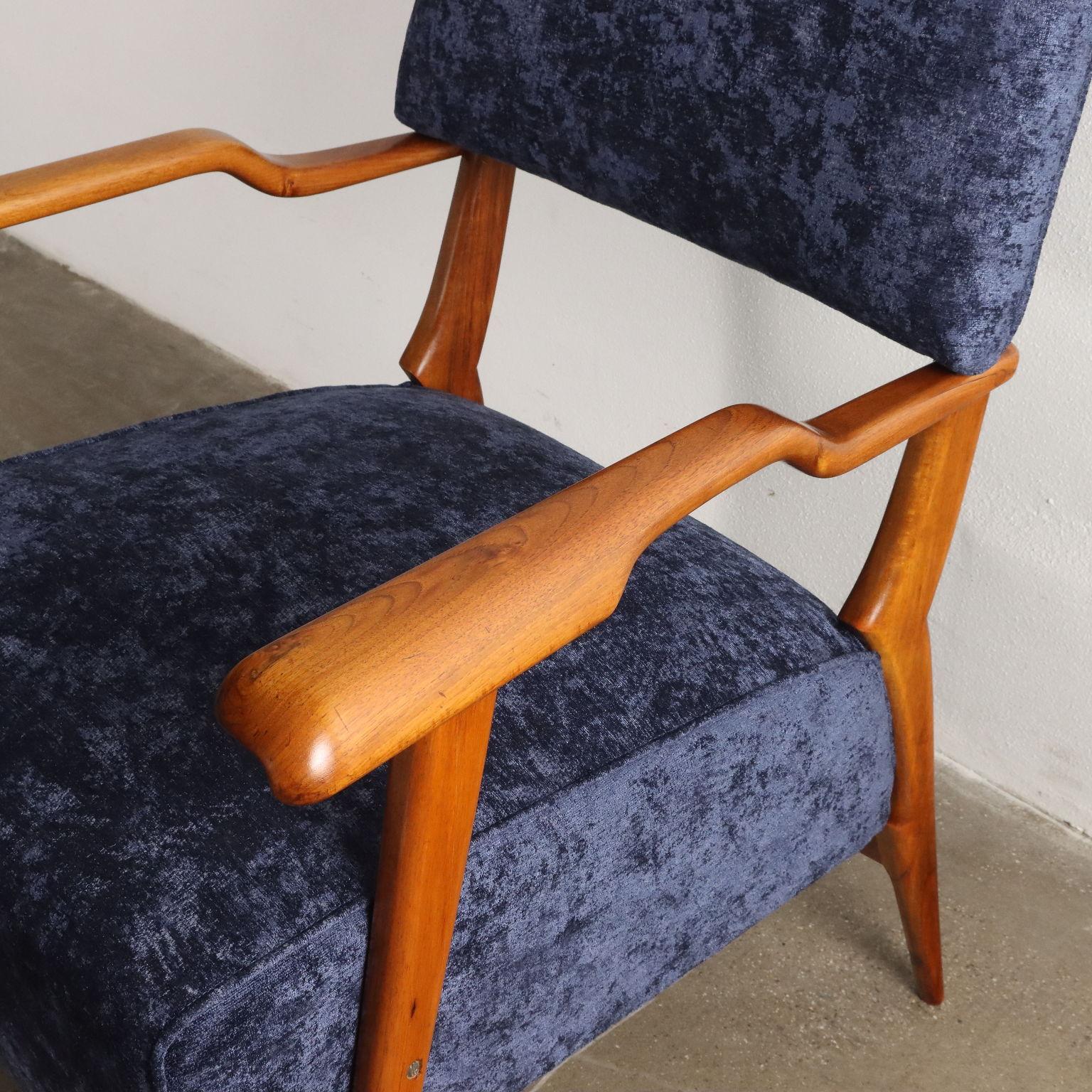 Mid-20th Century Pair of blue bellvet armchairs with wooden armrests 1950s For Sale