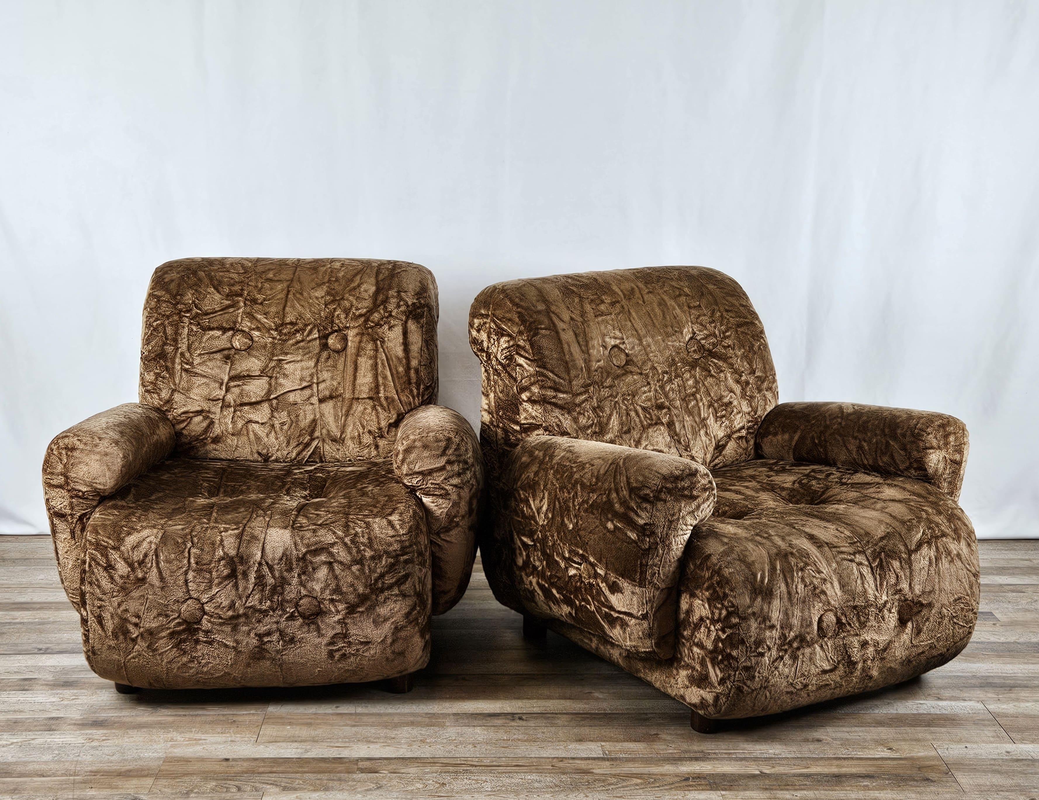Pair of 1970s armchairs upholstered in original vintage brown chenille, very comfortable and versatile thanks to the modern line they are ideal for all kinds of environments.

Normal signs of wear due to age and use.