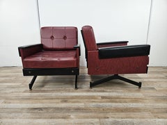 Pair of 1960s Italian iron and leatherette armchairs