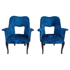 Vintage Pair of wood and bouclé armchairs, 1950s
