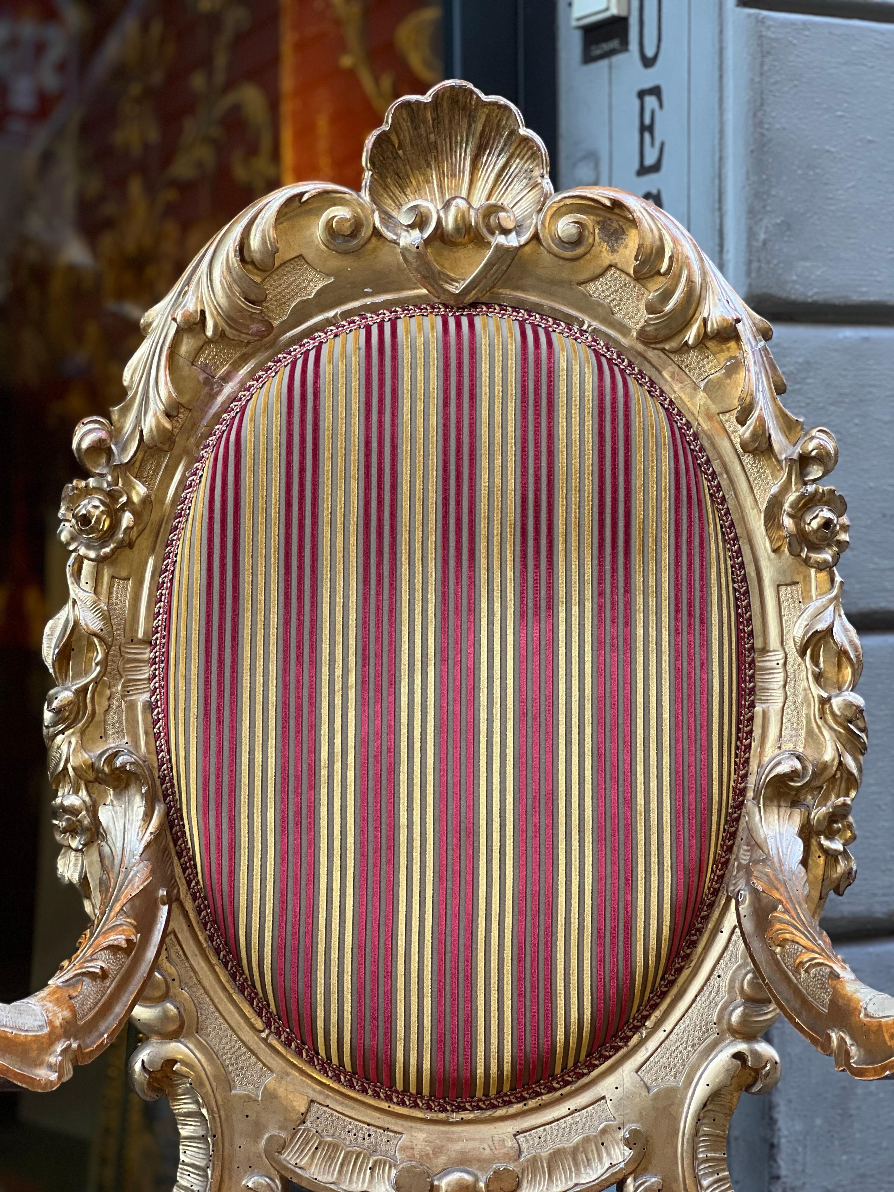 Italian Pair of carved and gilded wooden armchairs, Rome, 19th century For Sale