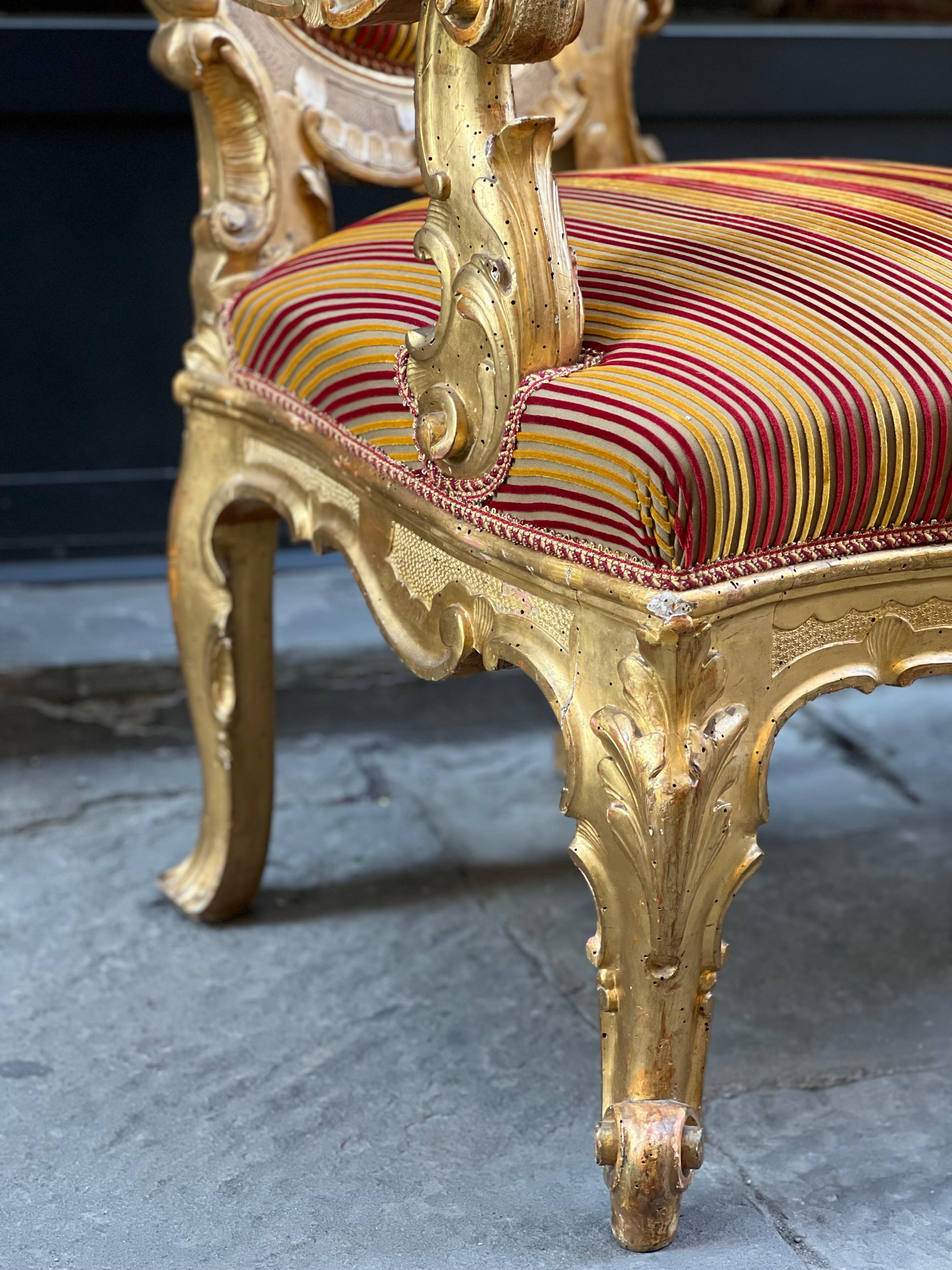 Carved Pair of carved and gilded wooden armchairs, Rome, 19th century For Sale