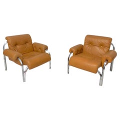 Coppia di poltrone in pelle, prod. Italiana, anni '70