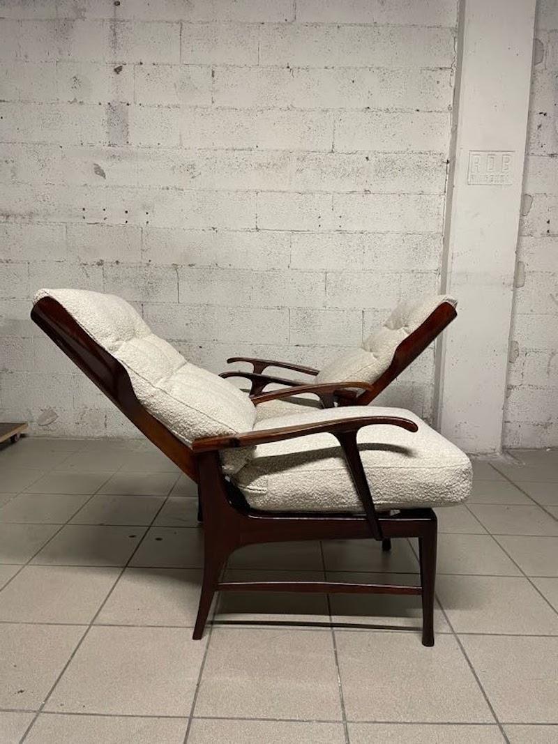 Pareja de sillones reclinables de los años 50 en madera y tela en venta 13