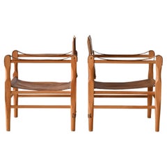 Paire de fauteuils scandinaves en cuir