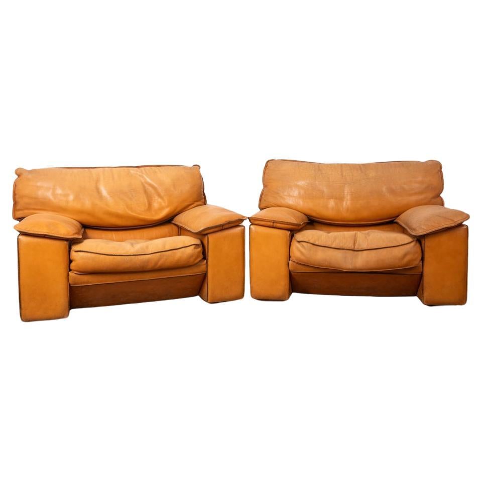 Pair of vintage 1970s beige leather armchairs designed by Ferruccio Brunati For Sale