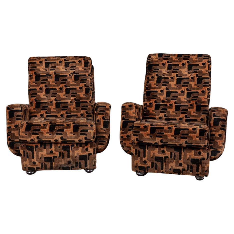 Coppia di poltrone vintage in velluto multicolore anni
70, design Italiano